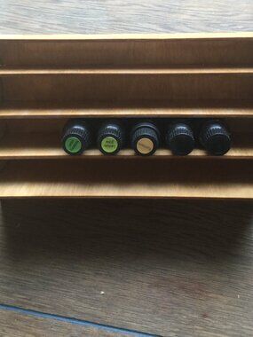 New 5 bottles of doterra oils not opened and wooden shelf for display each 15ml